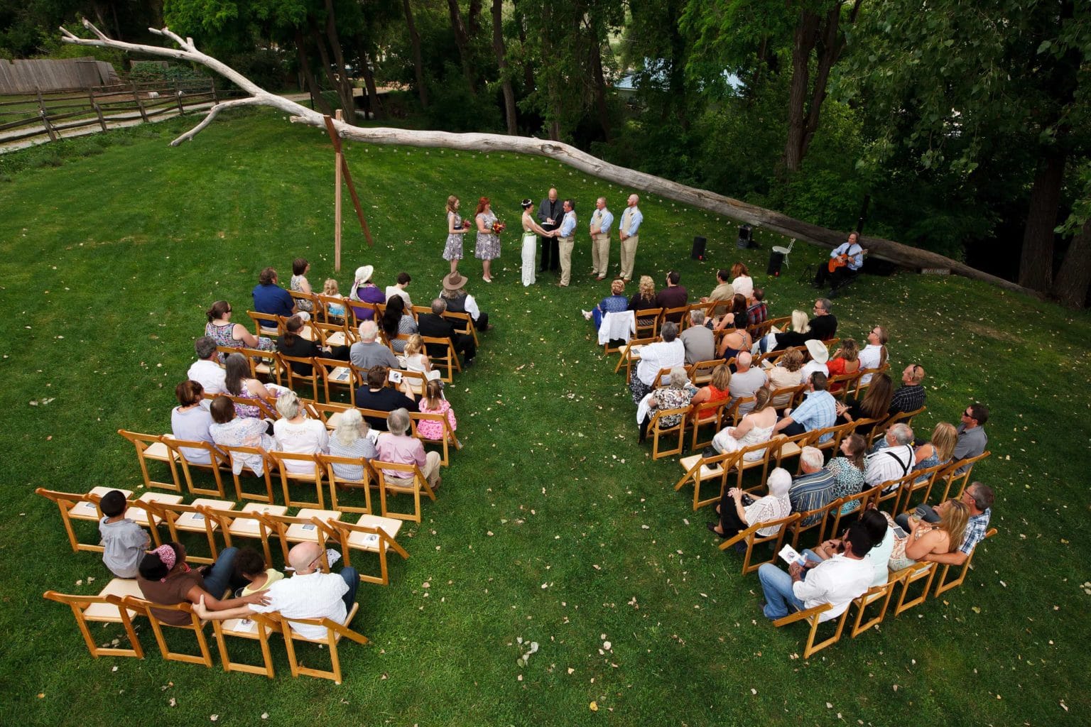 Outdoor Lyons Farmette wedding ceremony on the grass