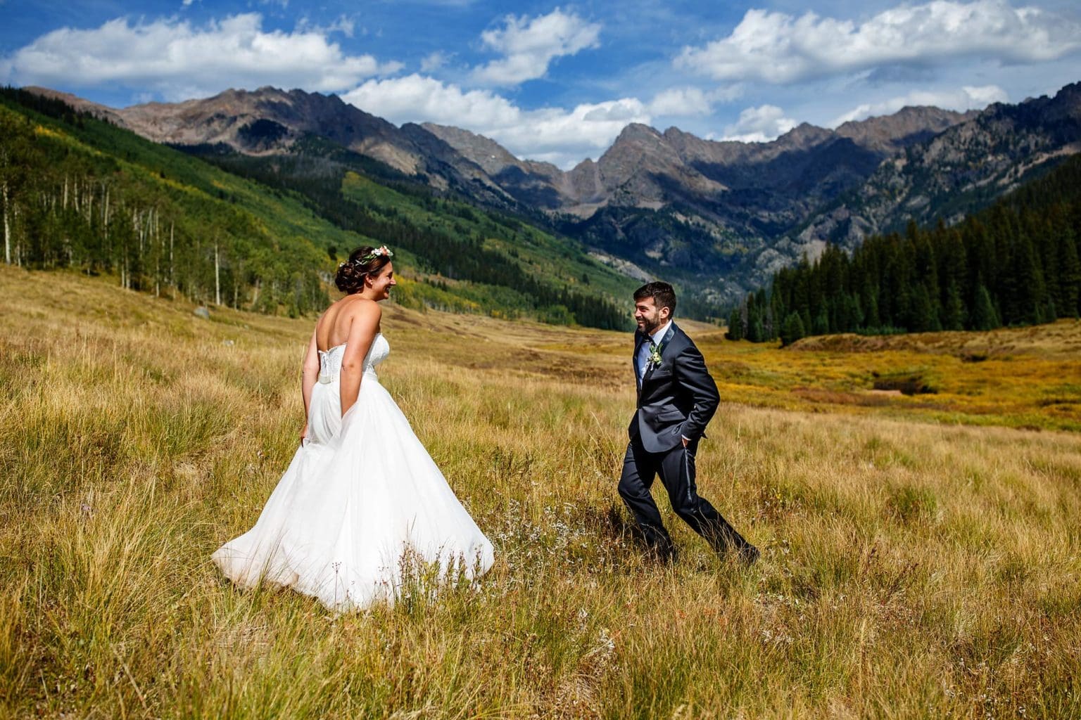 Becky and Brian share a moment during their first look at Piney River Ranch in front of the Gore mountain range.