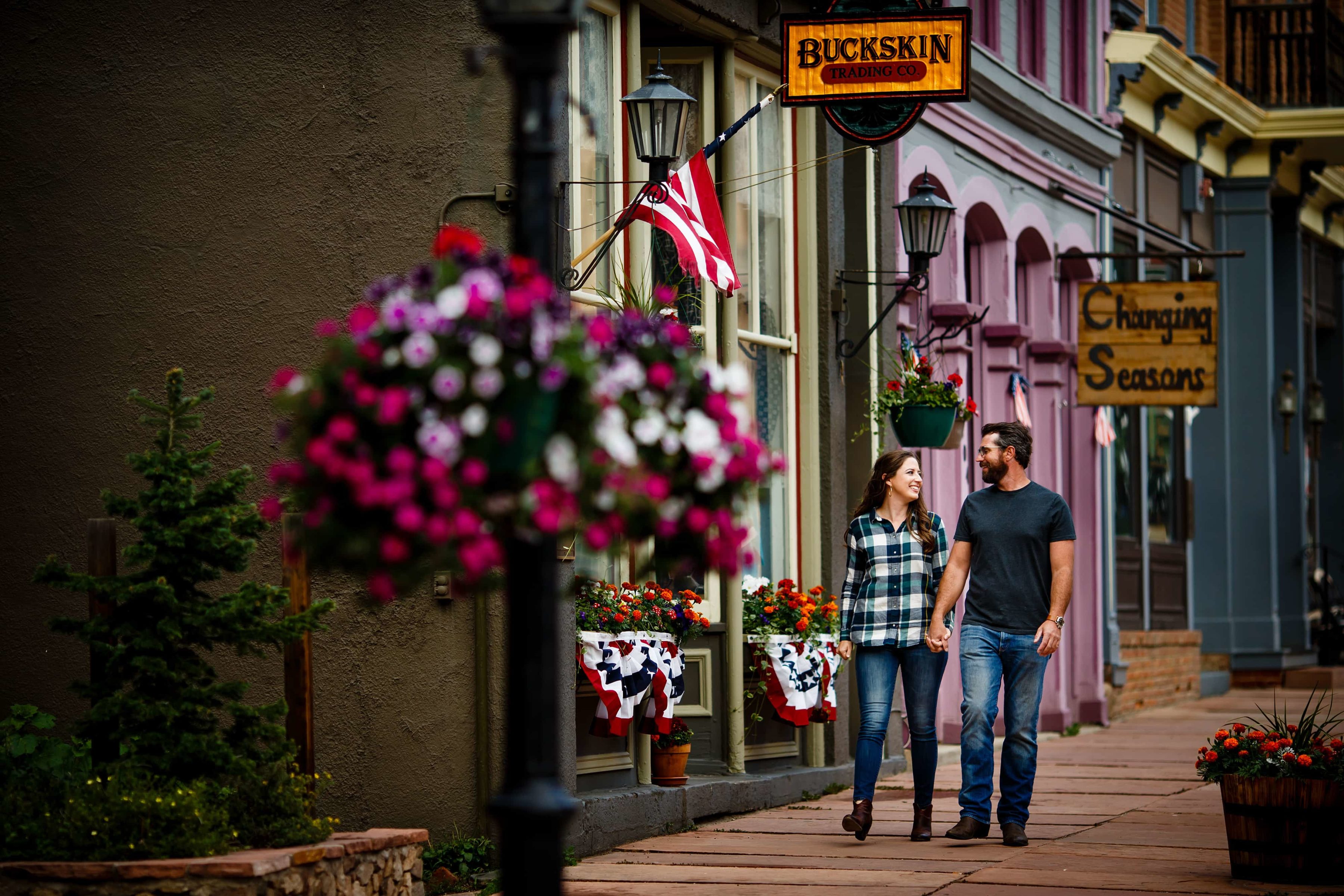 Mallory and Daniel walk down 6th street in Georgetown, Colorado in July.