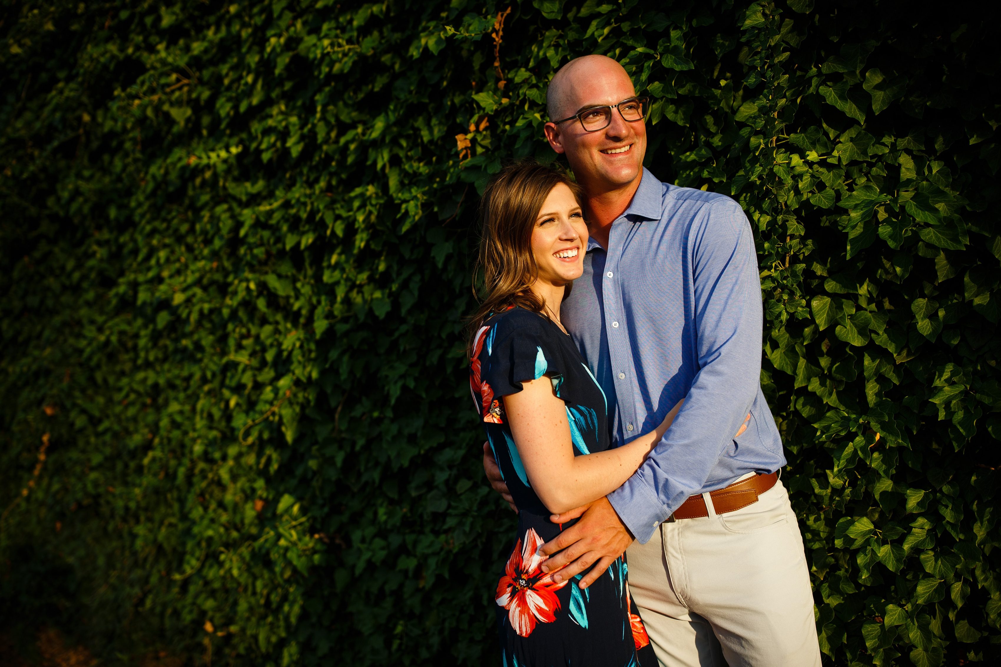 Cody and Erica share a laugh during their engagement photos in Royal Oak, Michigan