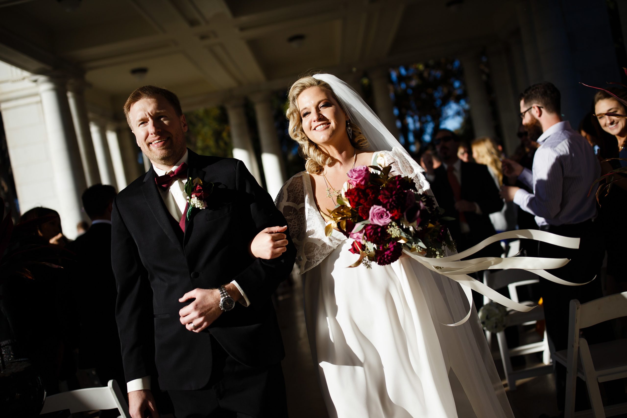 Ryan and Sarah walk down the aisle as husband and wife after their Cheesman Park wedding ceremony in Denver