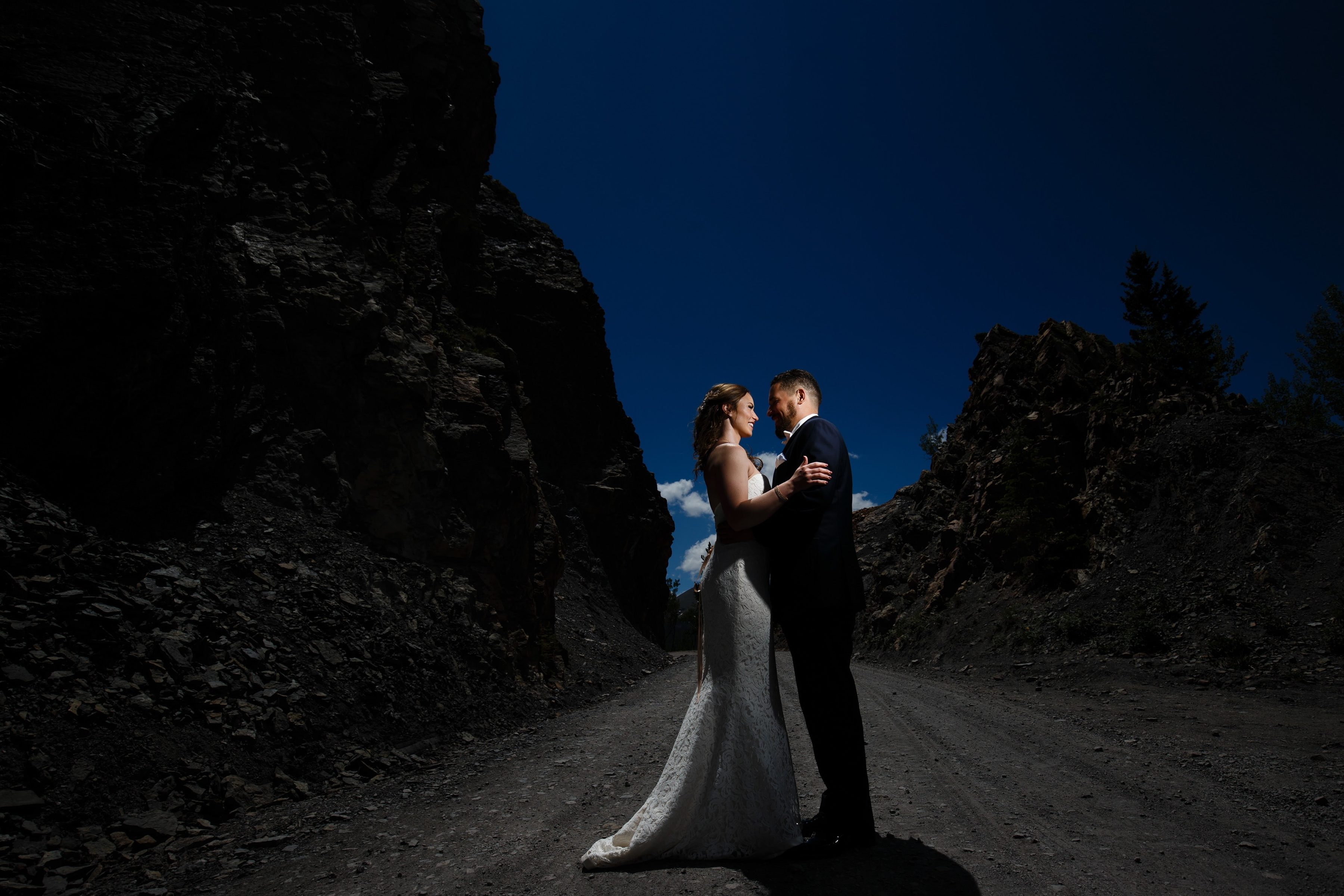 Sharon and Nick pose for a portrait on Boreas Pass road before their wedding at TenMile Station