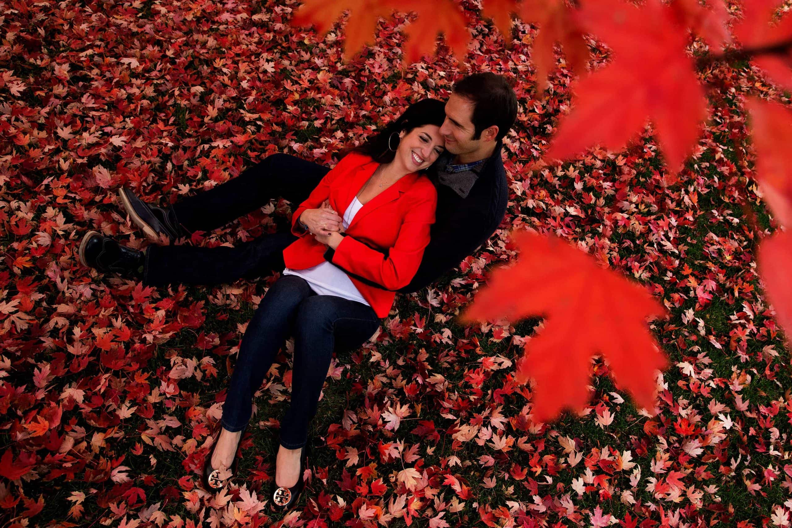 Denver fall colors engagement with red maple trees