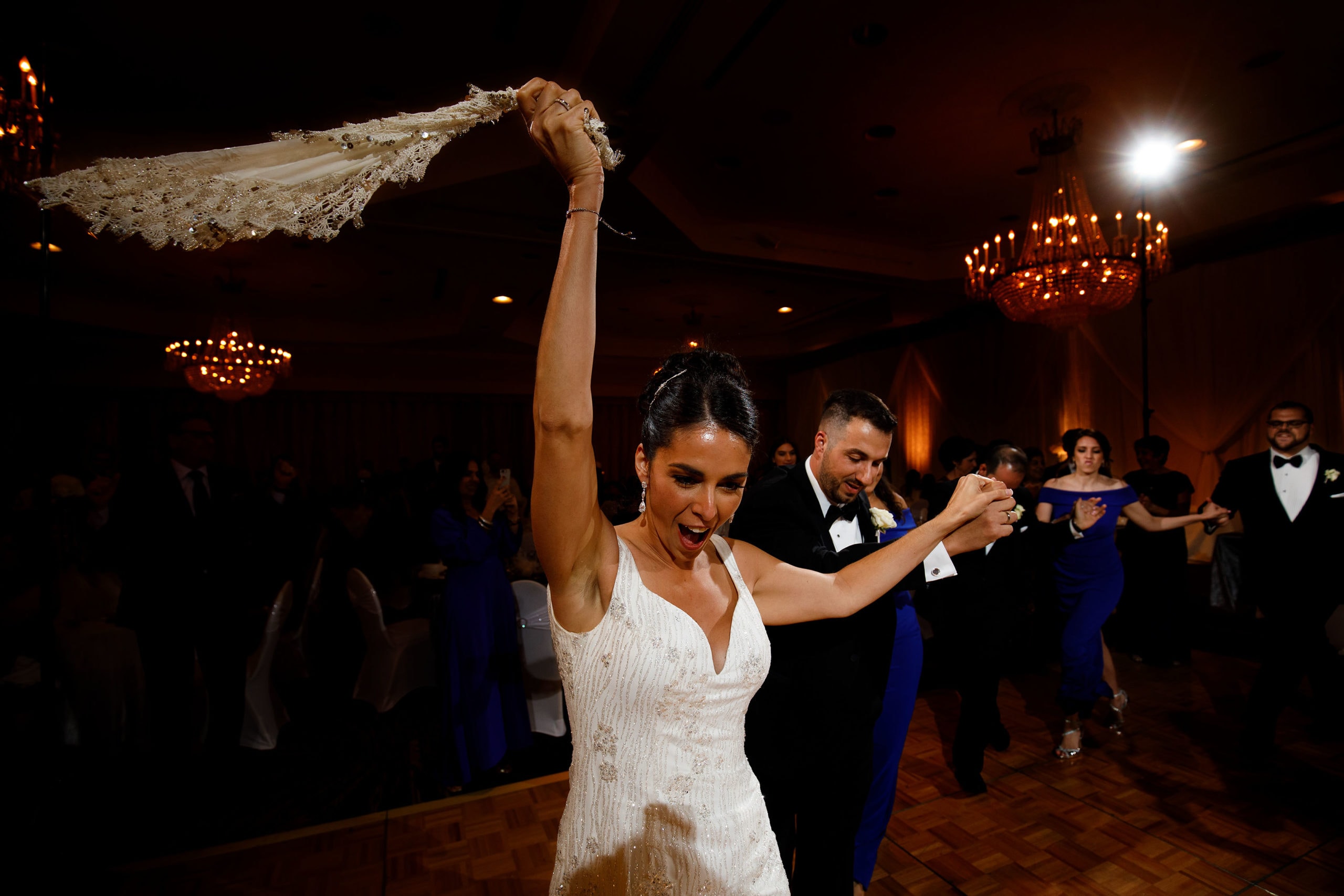 The bride leads the traditional Greek dance during her wedding at the Sheraton Albuquerque uptown