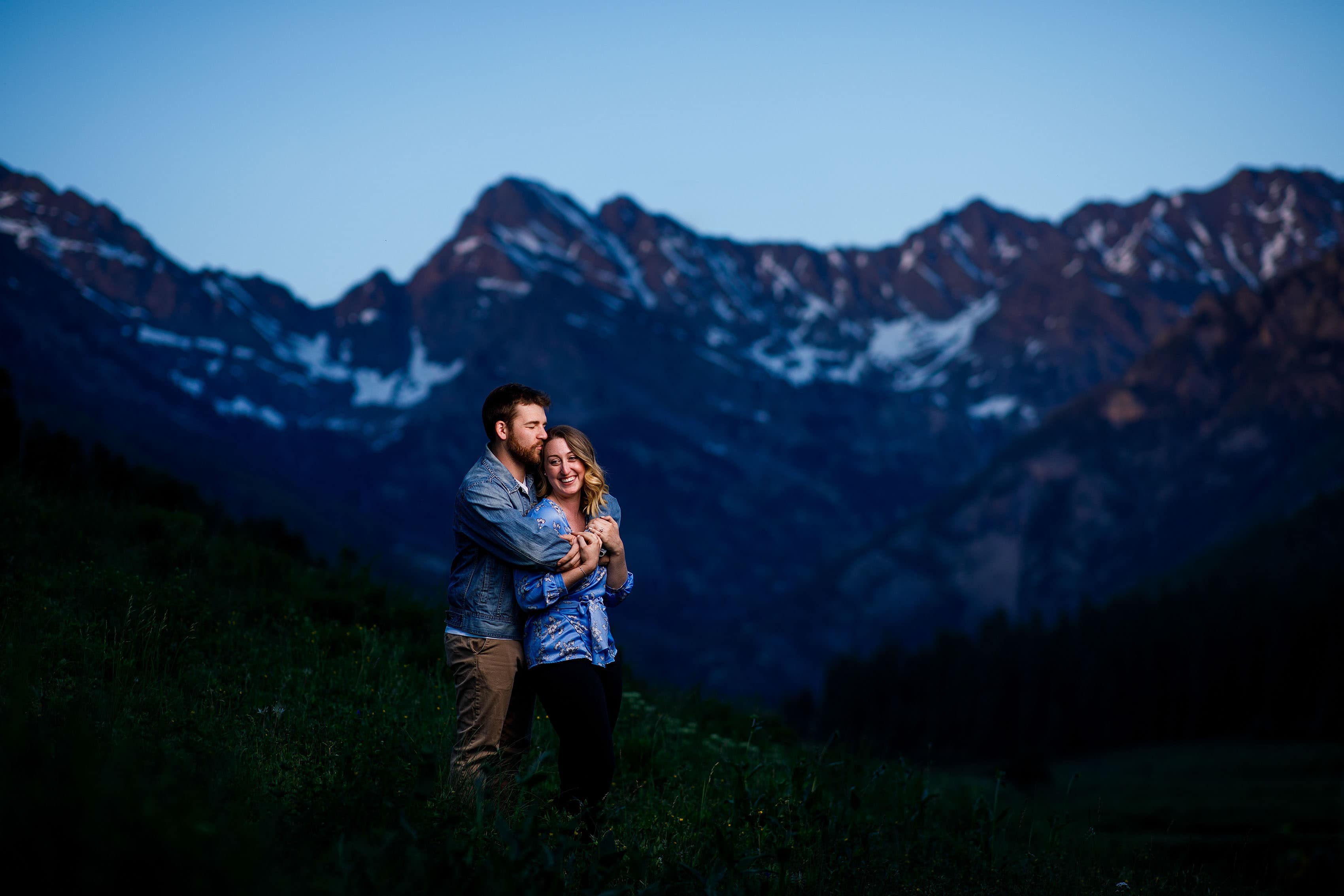 Laura and Ryan pose during their engagement at Piney River Ranch