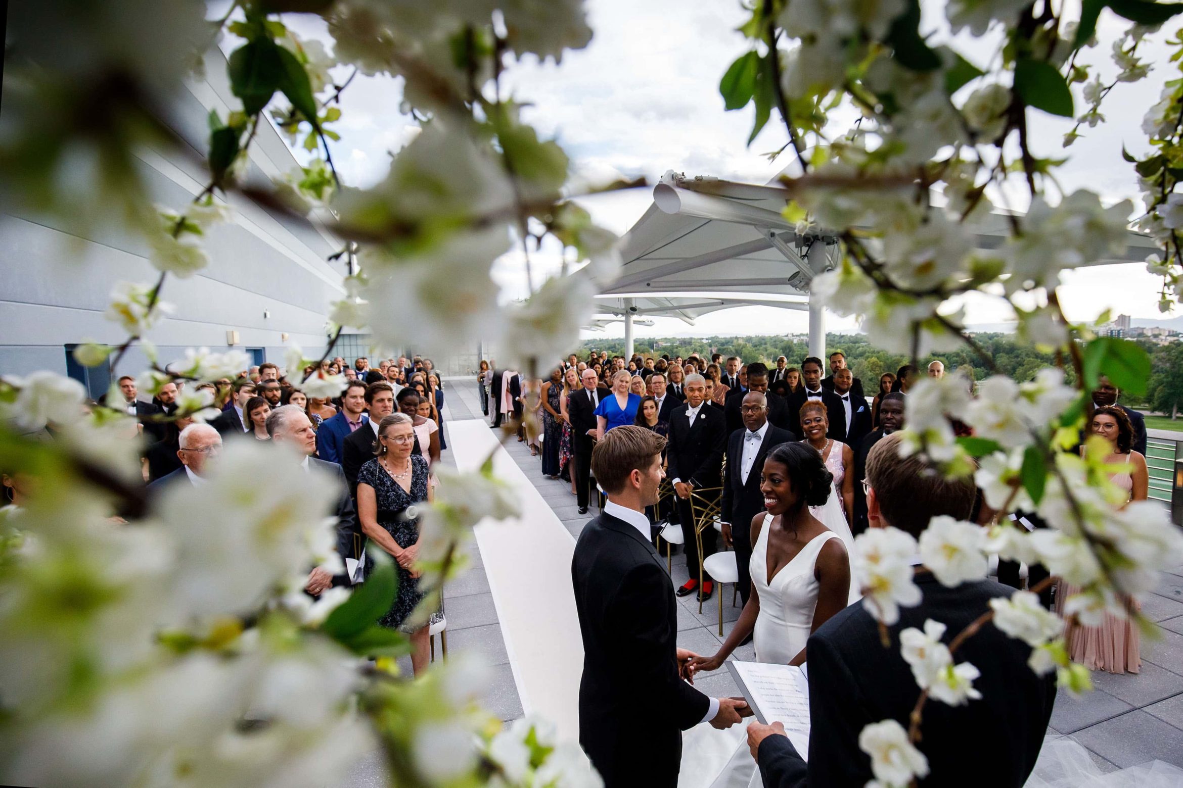 Rooftop wedding ceremony at the Denver Museum of Nature and Science