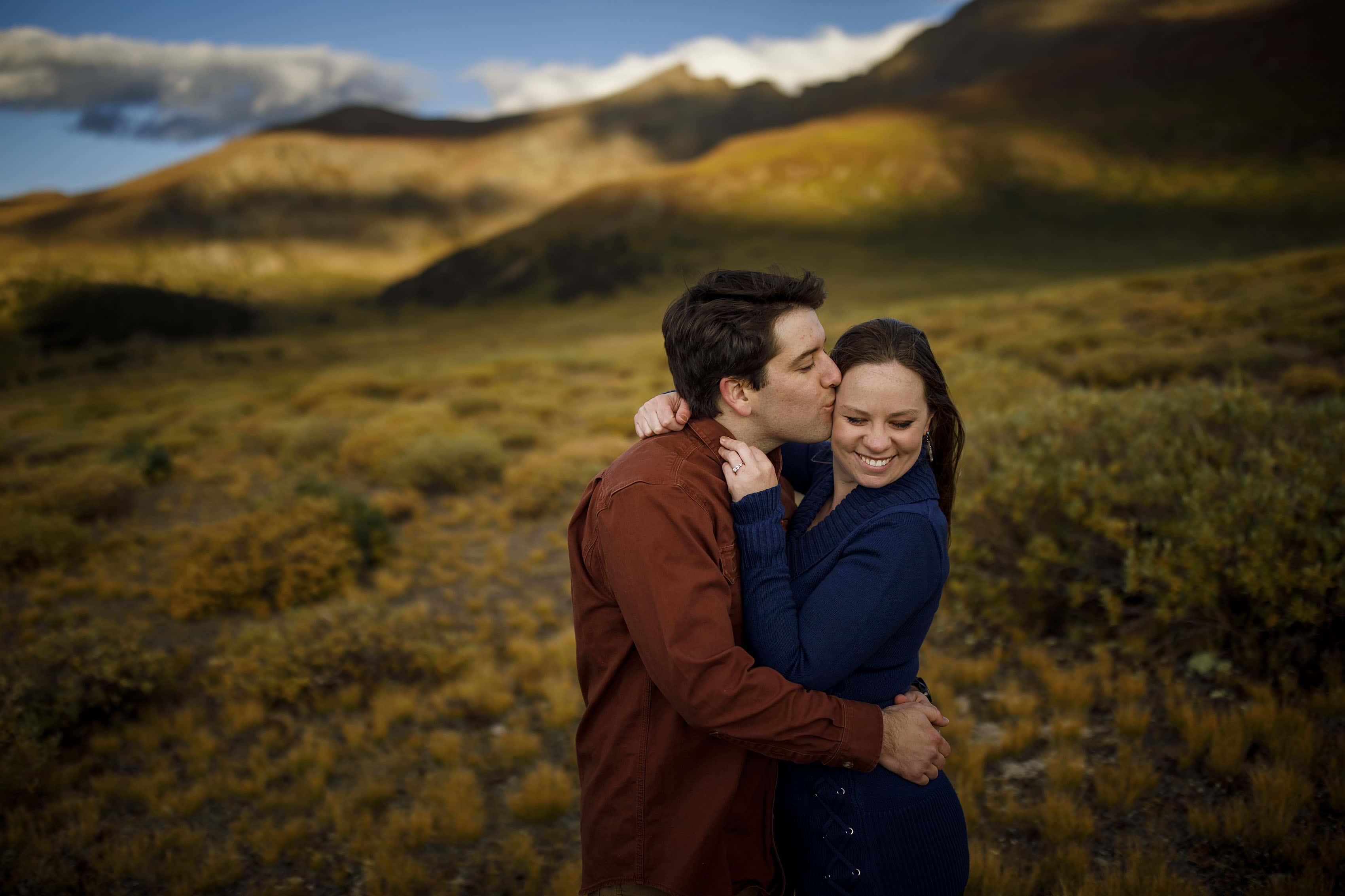 Chris and Madeline share a cute moments together as the sun sets during their Guanella Pass engagement session