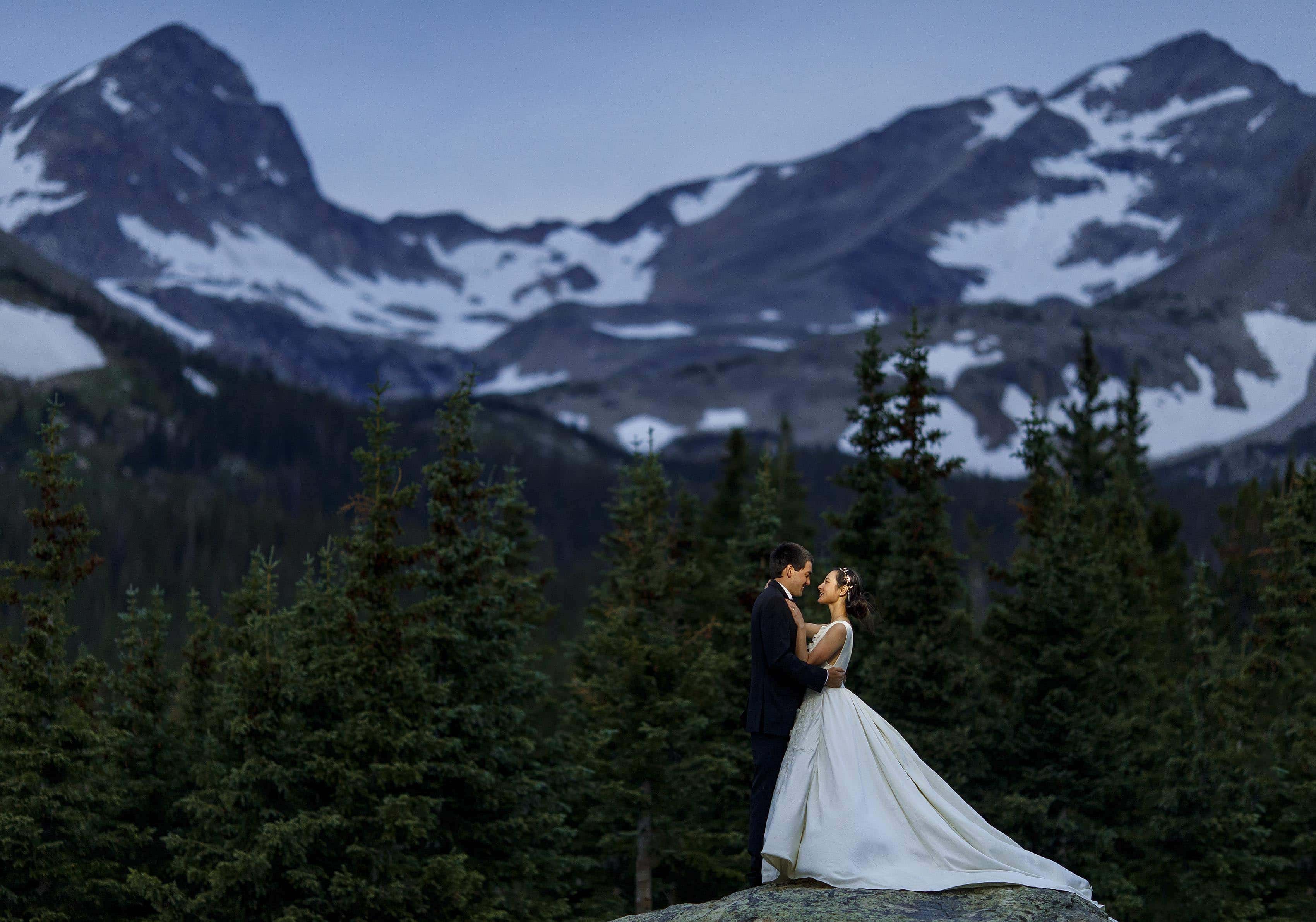 The newlyweds share a moment together at Brainard Lake during their mountain elopement near Ward, Colorado