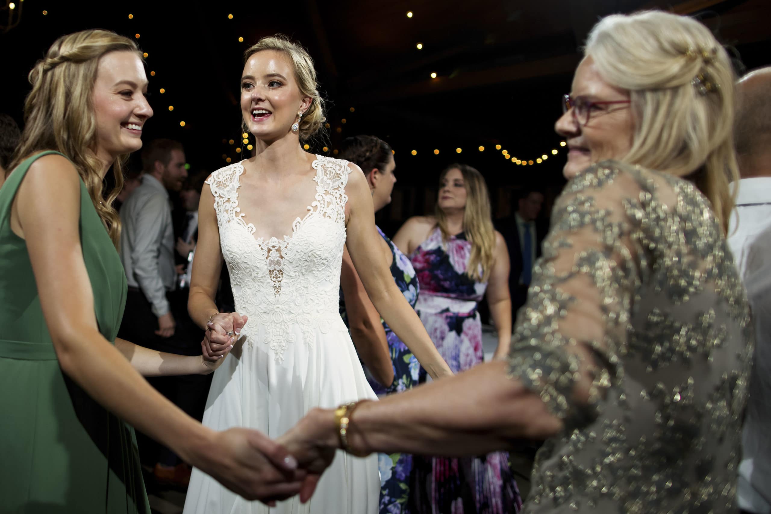 guests dance during a wedding reception at the barn at raccoon creek