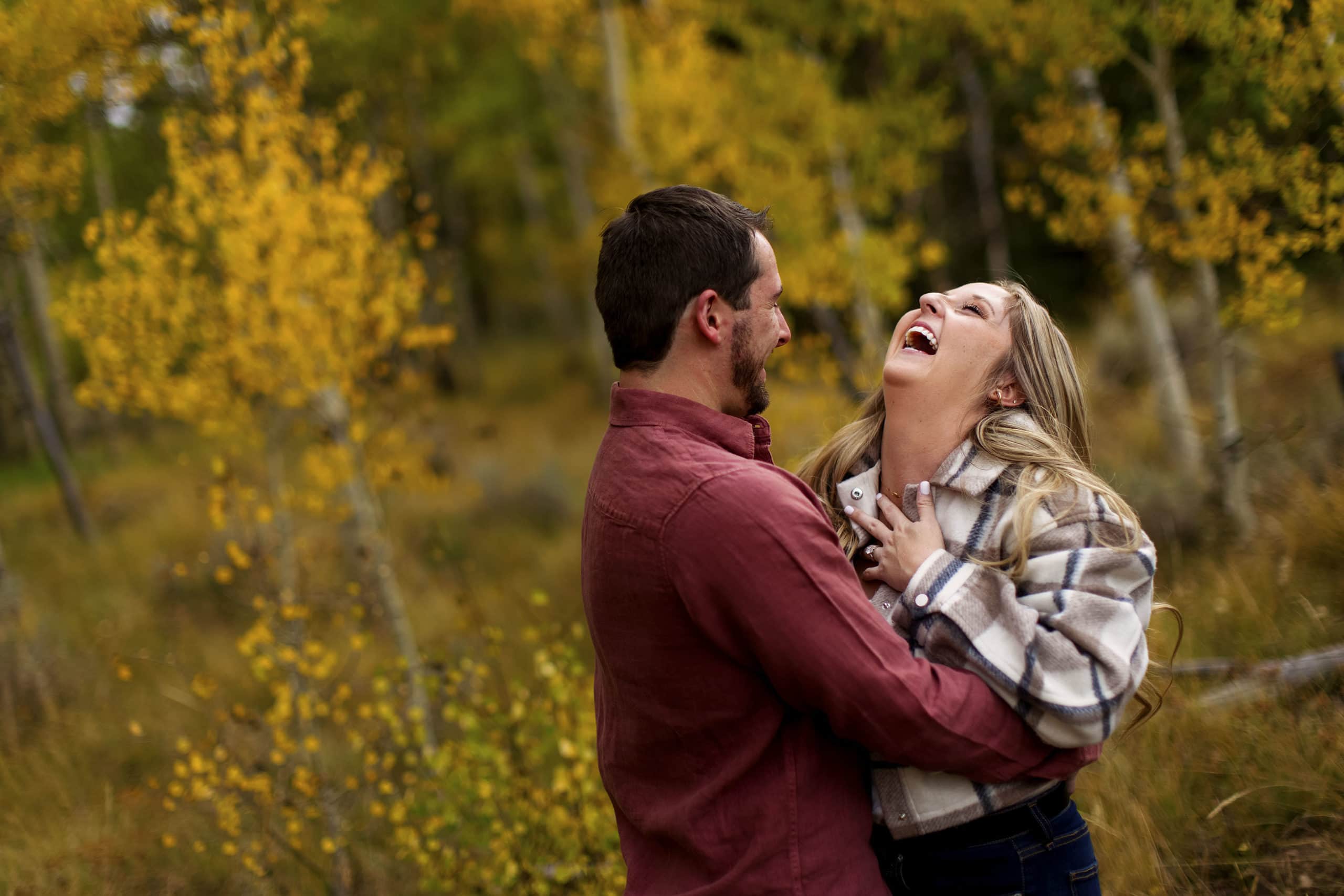 Jamie and Chad share a laugh during their engagement session
