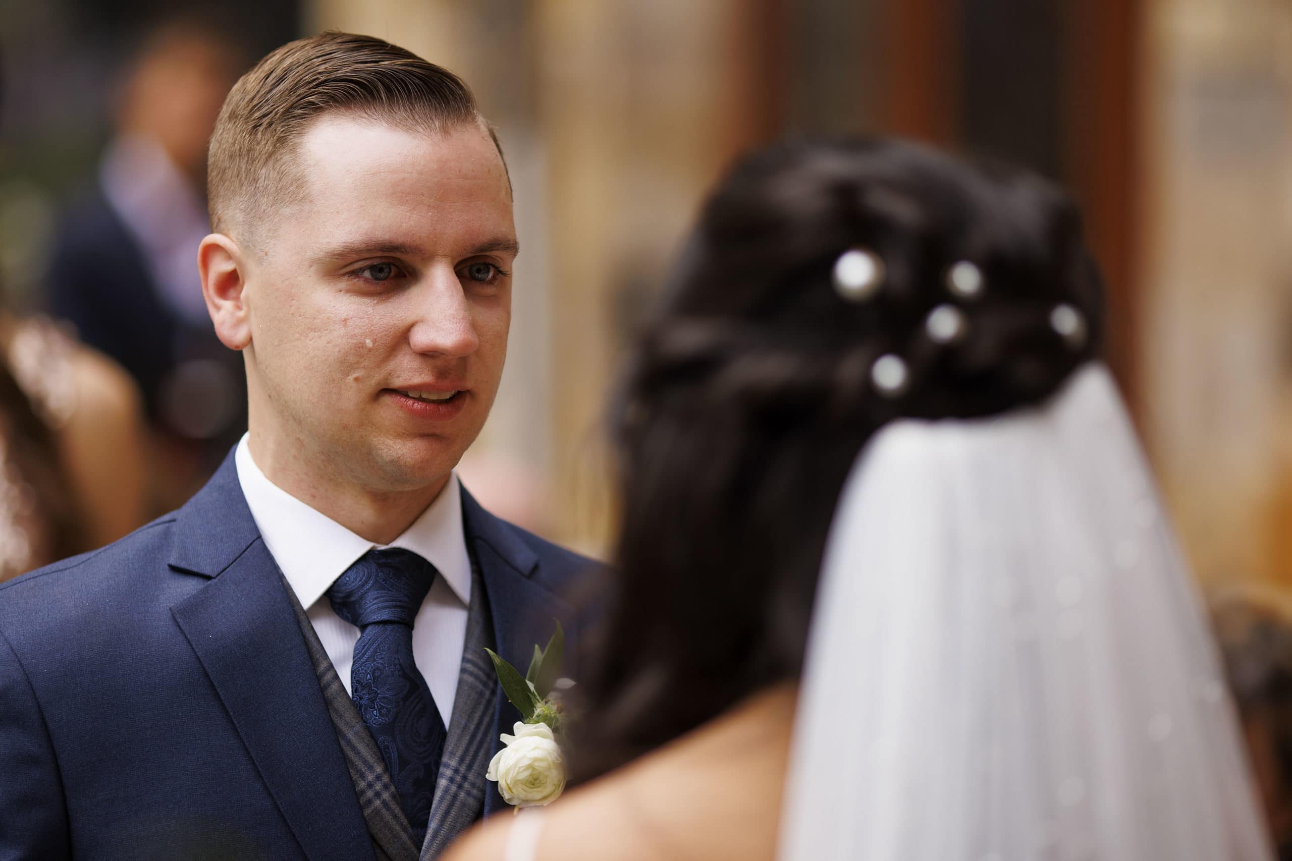 The groom cries as he reads his vows