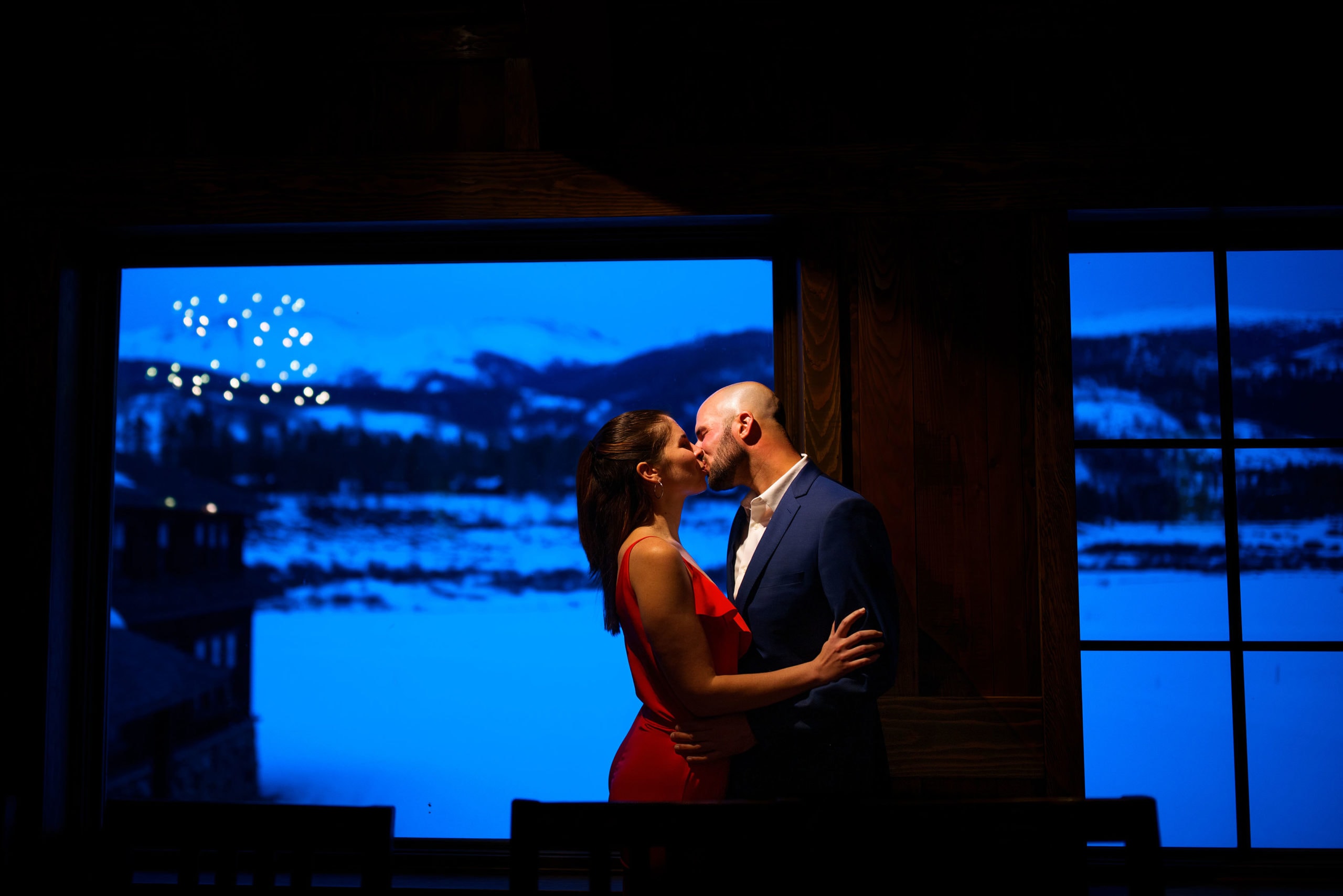 Michael and Sarah share a kiss in the bar at Devil’s Thumb Ranch during twilight