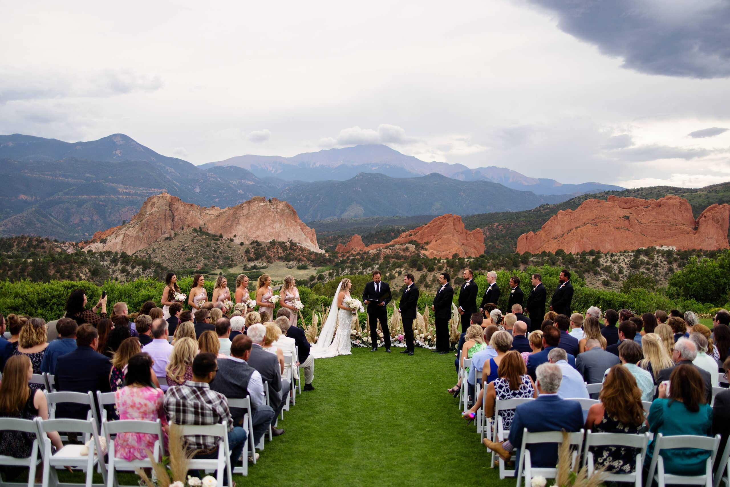 Jamie and Chad’s wedding ceremony at Garden of the Gods Resort in June