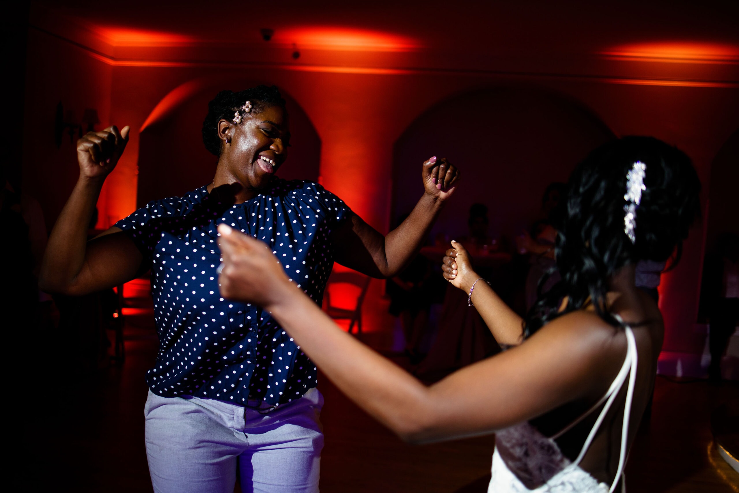 Guests dance during the wedding reception at Grant Humphrey’s Mansion