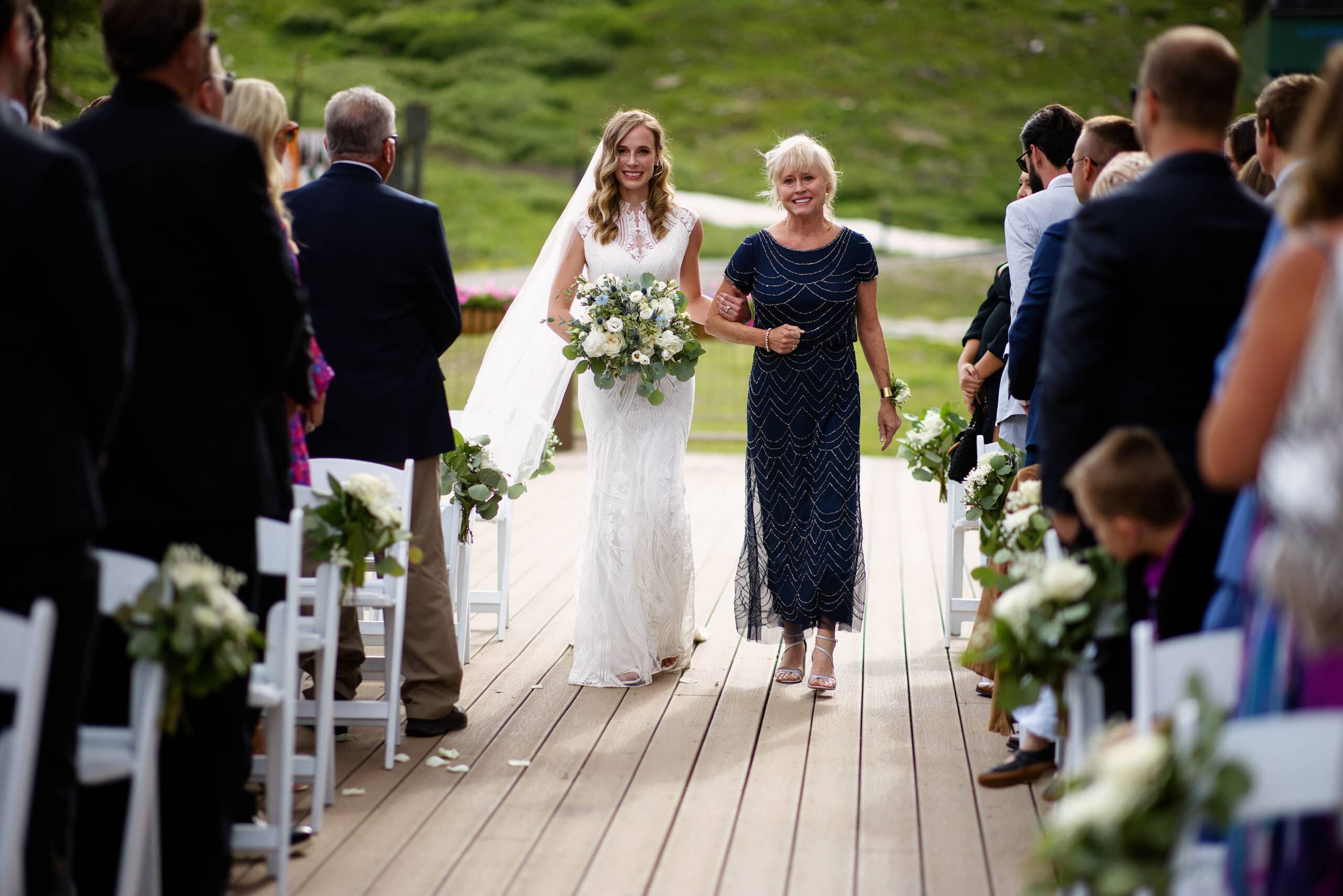 Keely walks down the aisle with her mother
