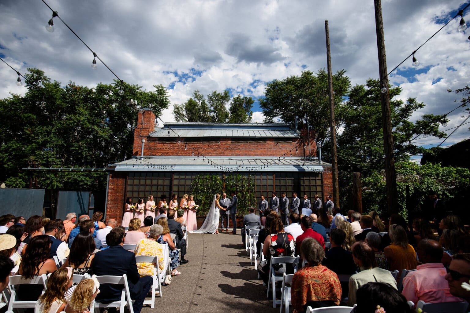 A general view of Kelly and Willy’s outdoor wedding ceremony in the courtyard at Blanc