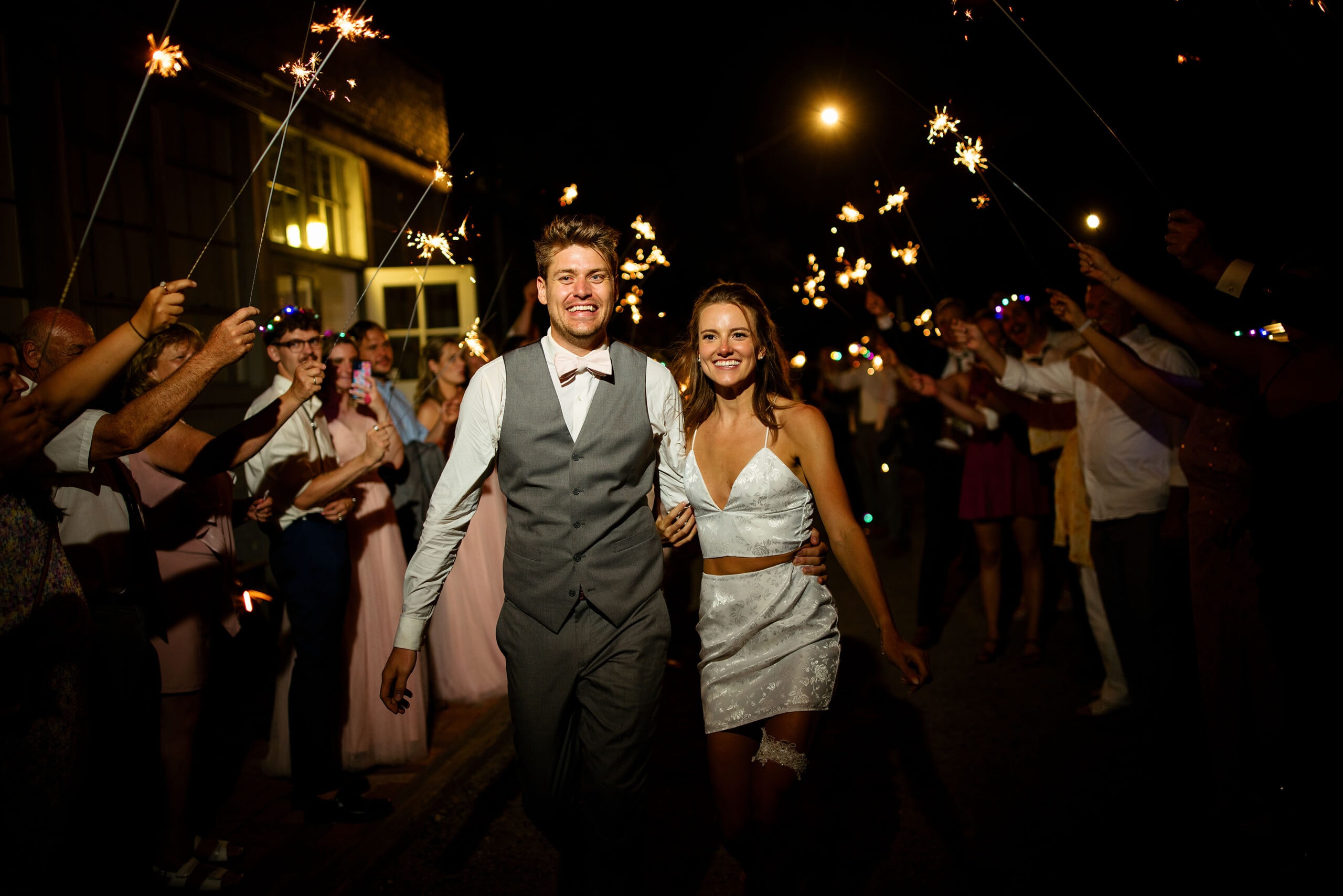 Willy and Kelly exit their wedding through a tunnel of sparklers at Blanc in Denver