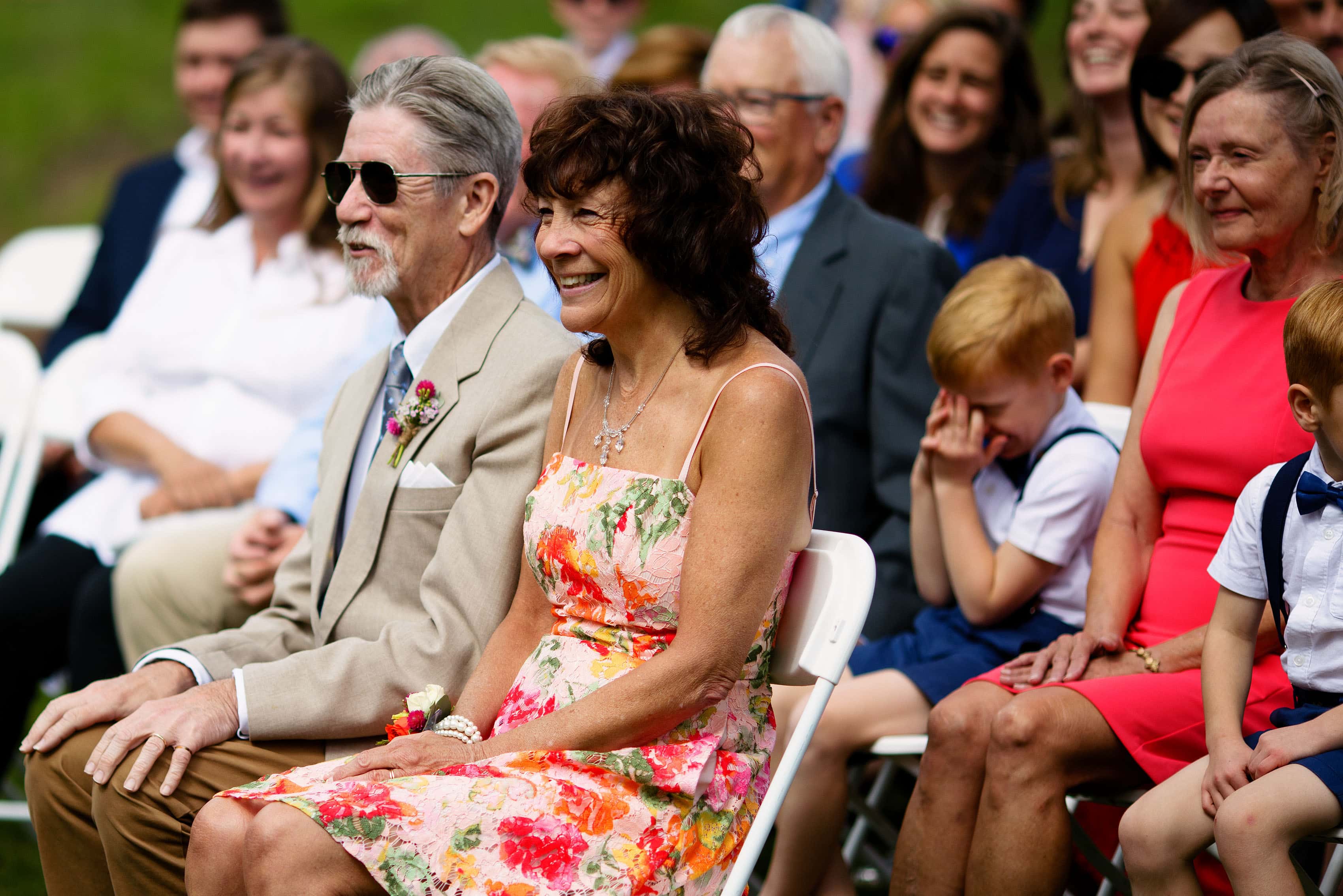 Parents laugh during the ceremony