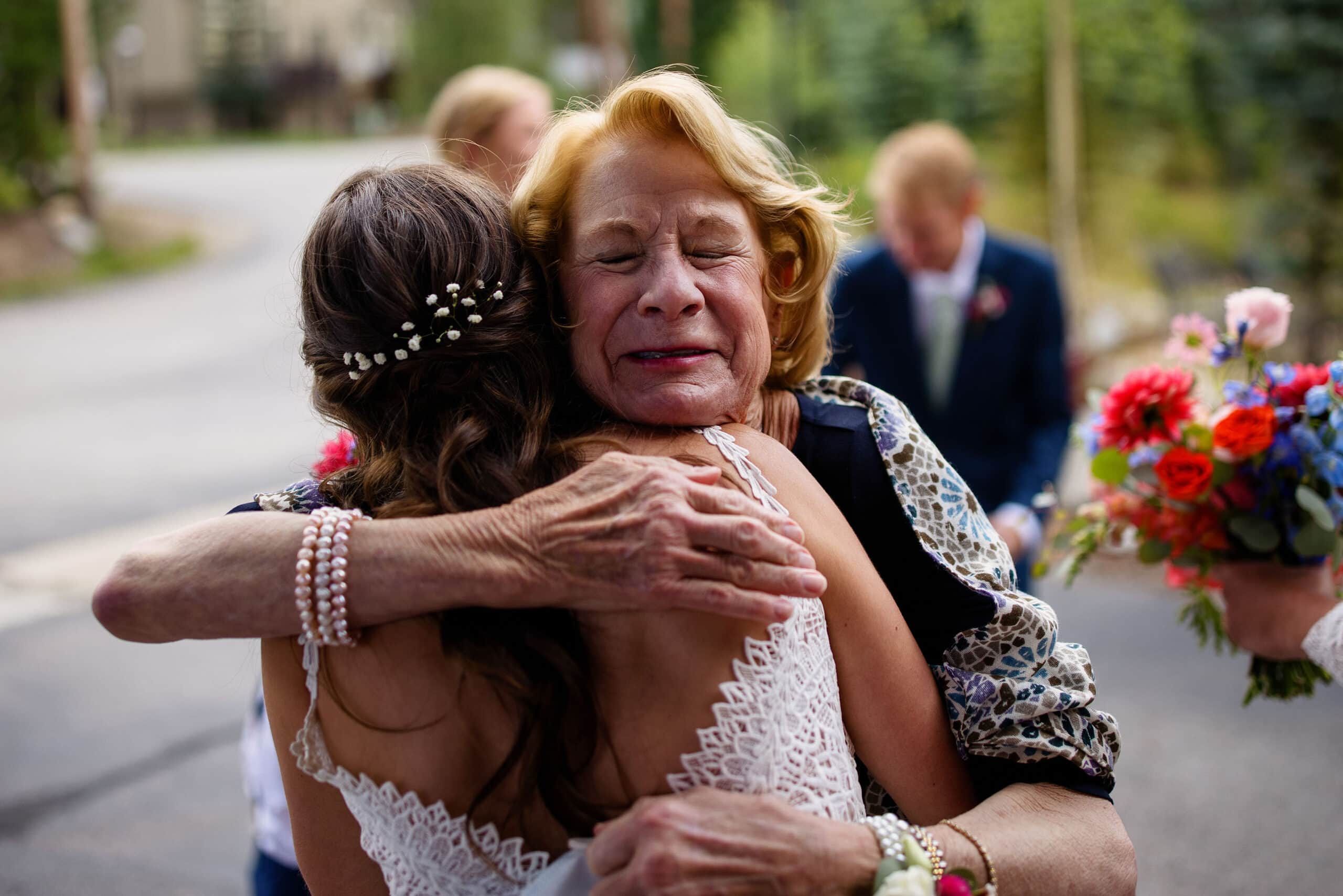 Anna’s mother hugs her after the ceremony
