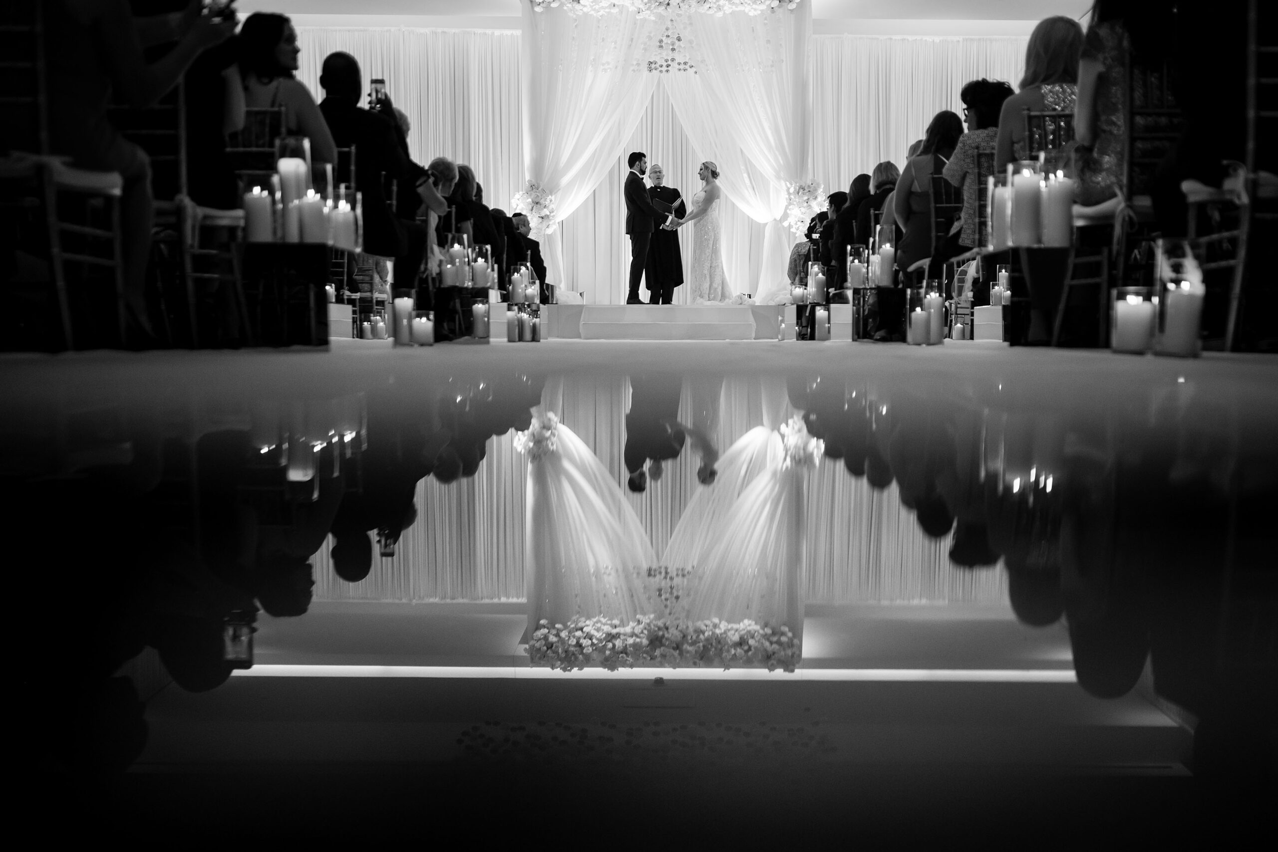 The ceremony is reflected in the floor at Four Seasons Hotel Denver