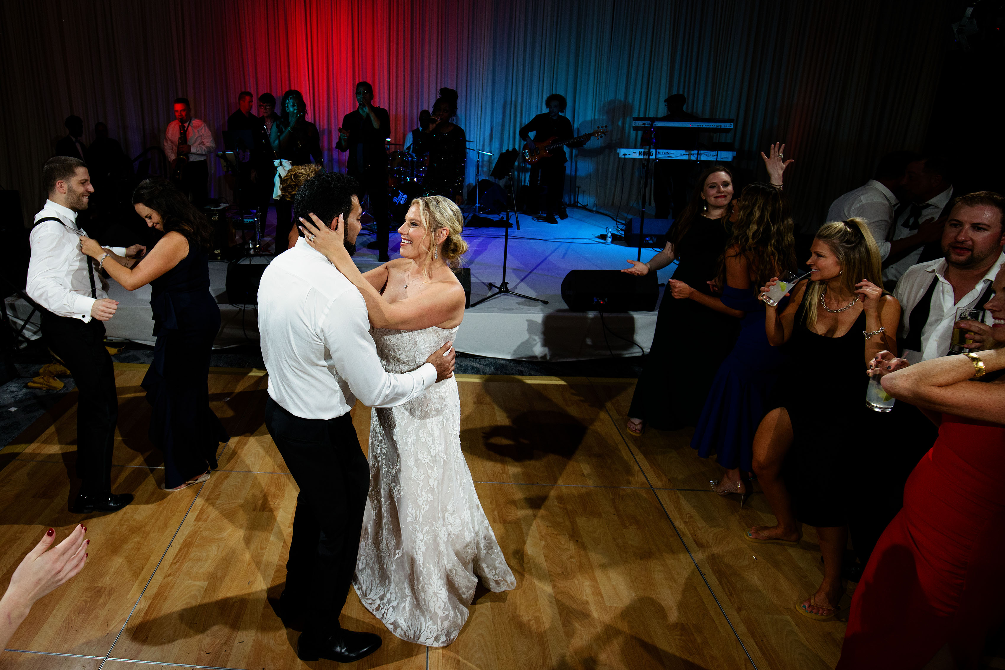 Guests dance during a wedding reception at Four Seasons Hotel Denver