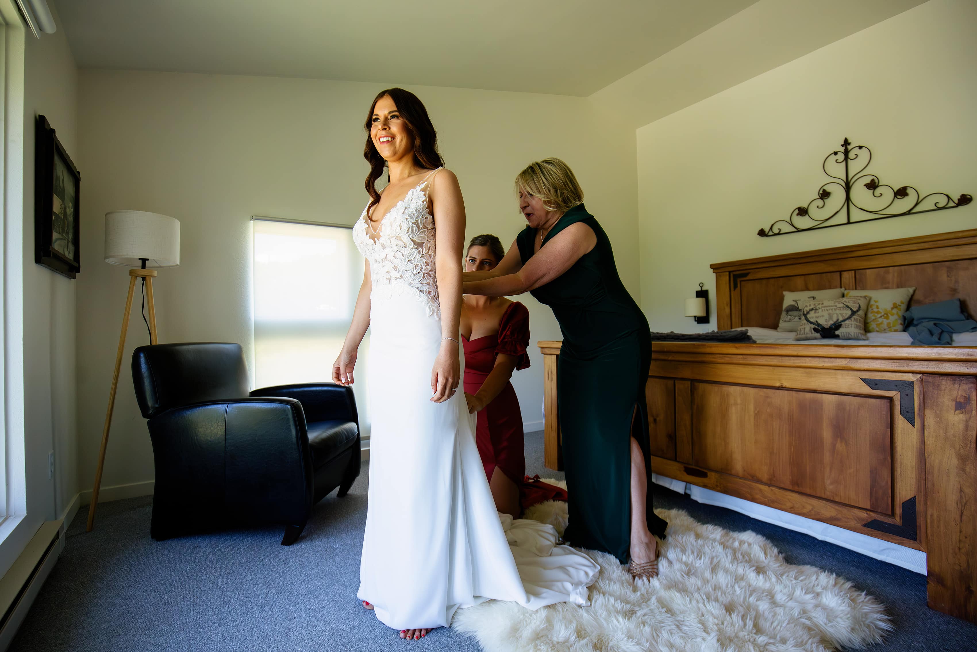 The bride gets into her gown