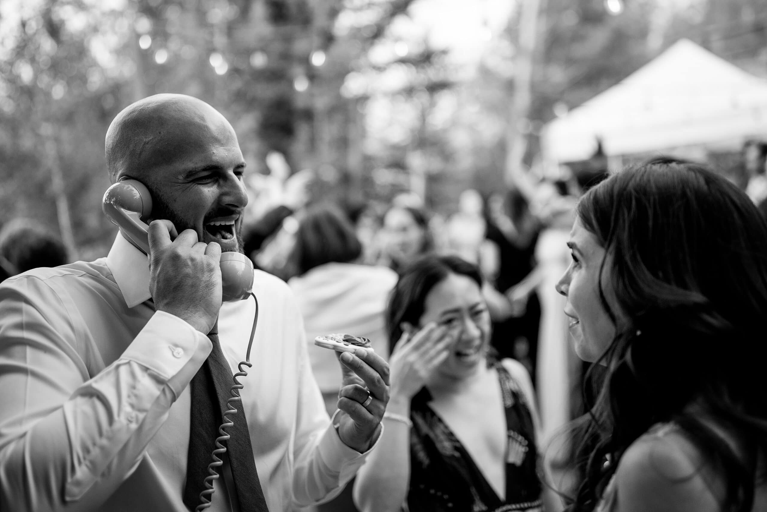 The groom records a message for the bride during their wedding reception